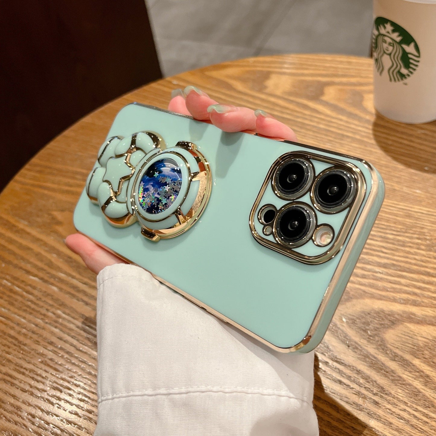 Quicksand Holding Star Spaceman Support Phone Case