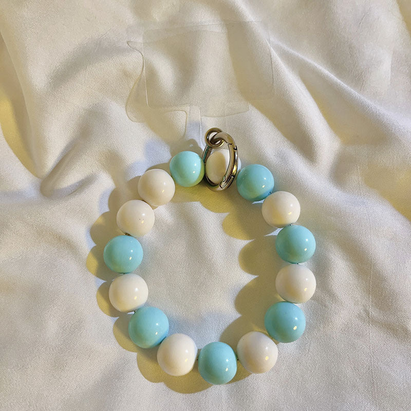 Custodia universale per telefono con cordino a catena con perline grandi della serie String Color