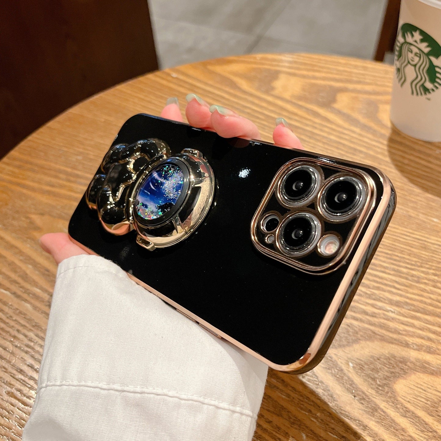 Quicksand Holding Star Spaceman Support Phone Case