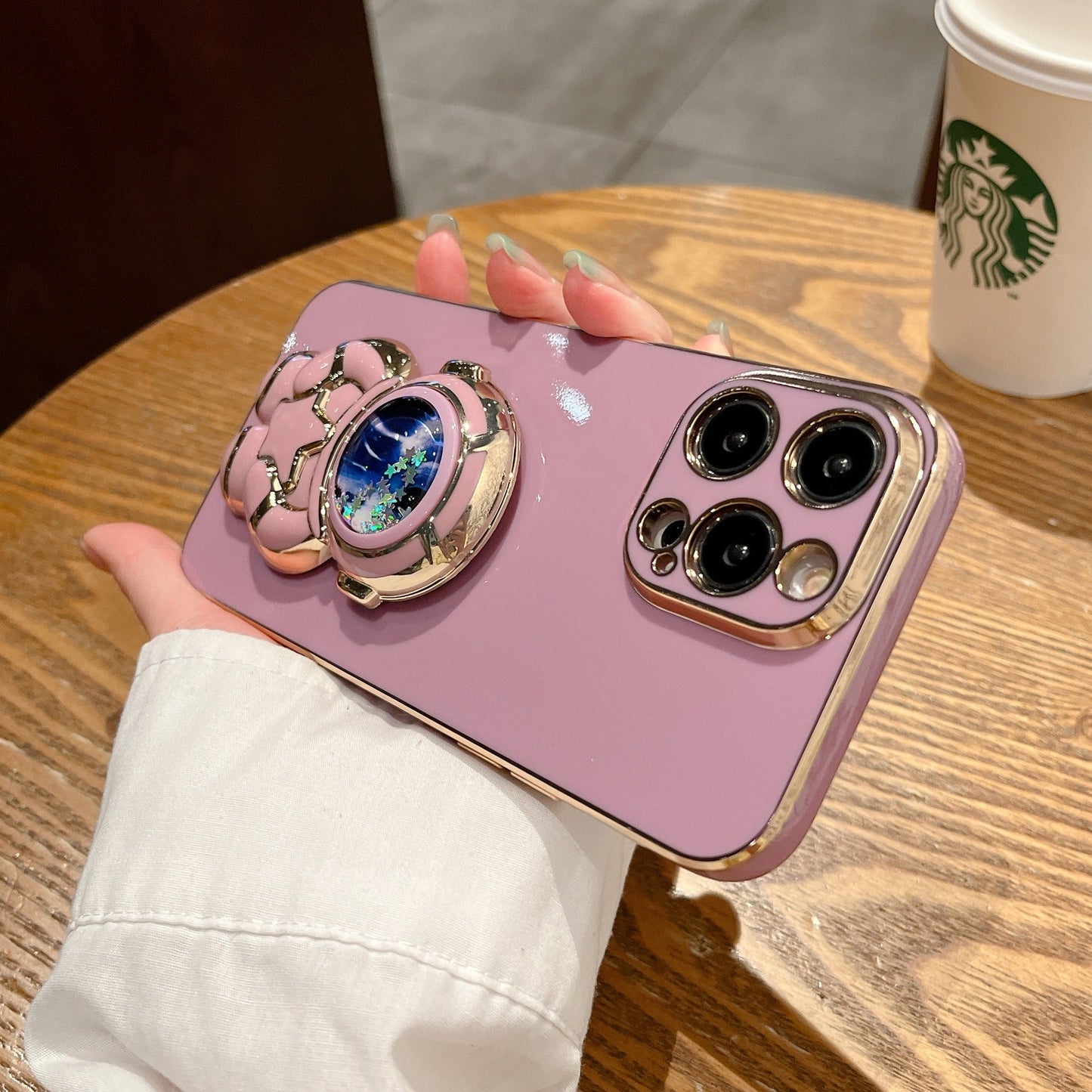 Quicksand Holding Star Spaceman Support Phone Case