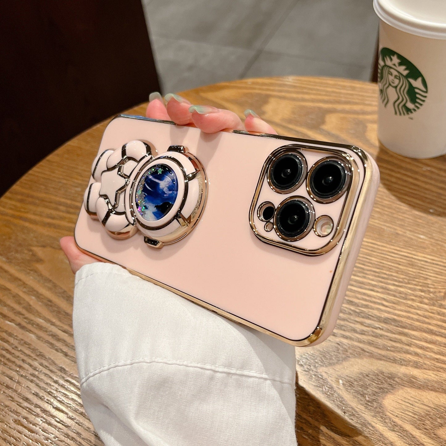 Quicksand Holding Star Spaceman Support Phone Case