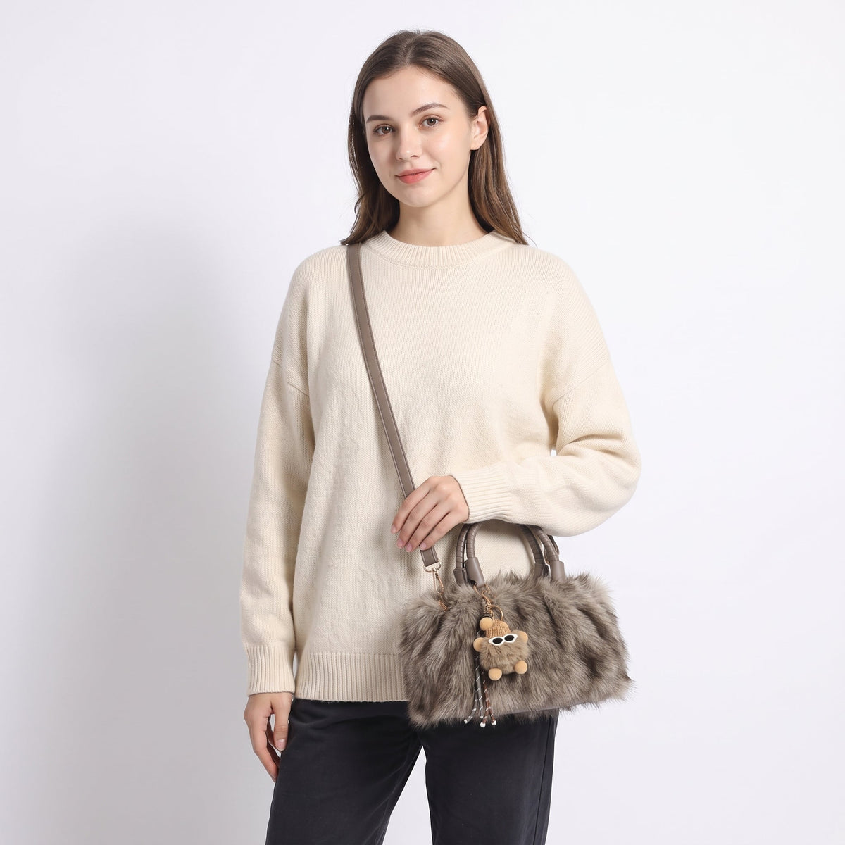 Tecla Borsa Pelosa con due manici intrecciati a tracolla regolabile